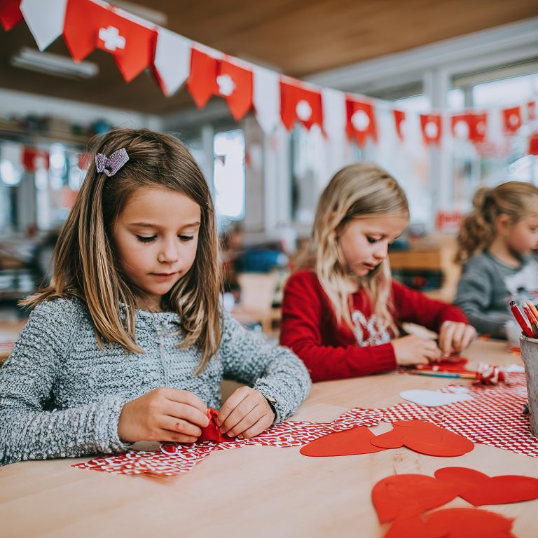 Children crafting red and white decorations in a school to celebrate Swiss National Day --chaos 9 --ar 3:2 --v 7 Job ID: 8a97c6b5-e63c-4cc4-af4e-6a623b61fd68